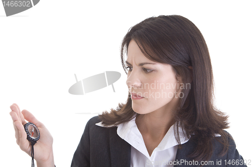 Image of White Woman Looking at Intently at Compass Isolated Background