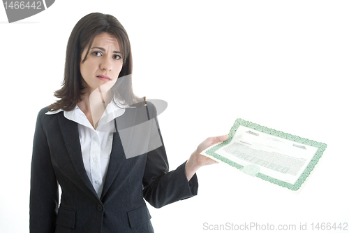 Image of Caucasian Woman Unhappy with Stock Market Looking at Camera