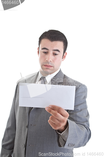 Image of Sad Caucasian Hispanic Man Looking at Blank Envelope White Backg
