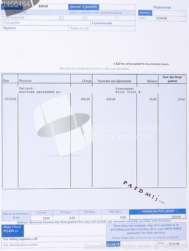 Image of Paper Medical Bill Form Stamped "PAID" Health Care