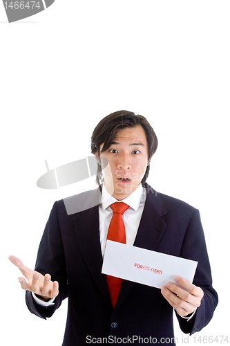 Image of Shocked Asian Man Holding a Foreclosure Notice Envelope Isolated