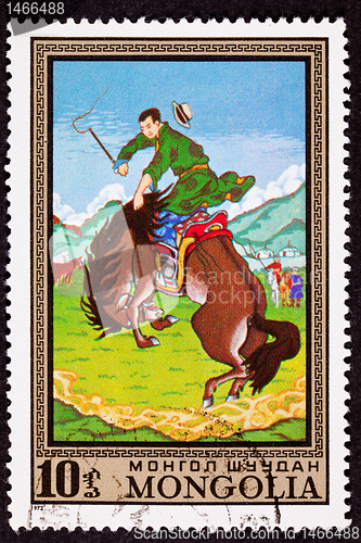 Image of Canceled Mongolian Postage Stamp Bucking Bronco Man Breaking Wil