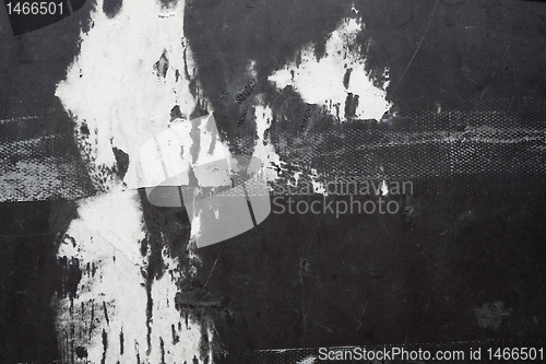 Image of Full Frame Wall Peeling Paper Scraps Tape Stains