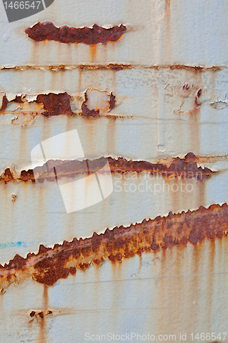 Image of XXXL Full Frame Peeling Paint Rust Stains on Gray Metal Surface