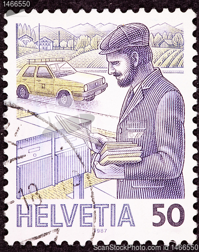 Image of Canceled Swiss Postage Stamp Postman Delivering Letters Mail Box