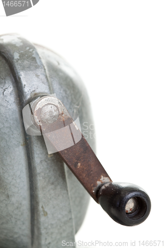 Image of Close-Up Crank Handle Old Manual Pencil Sharpener, White Backgro