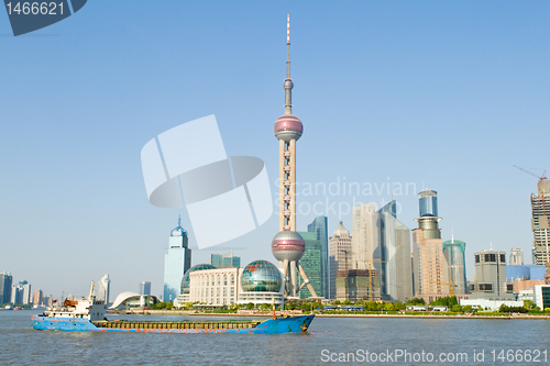 Image of Oriental Pearl TV Tower with Huangpu River Foreground Pudong Sha