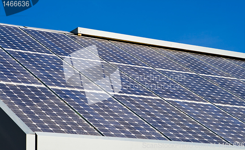 Image of Rows Solar Panels Array Roof Blue Sky Background