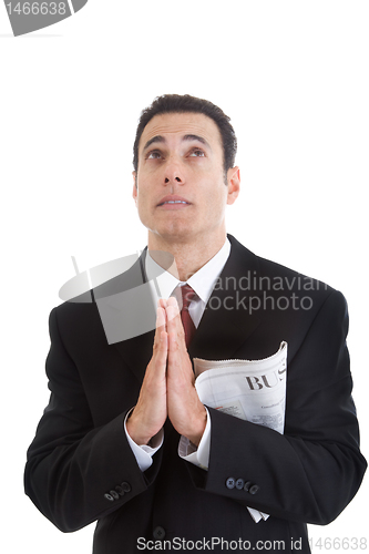 Image of Worried Businessman Holding Business Section Newspaper Looking U