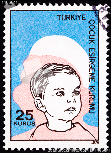Image of Canceled Turkish Postage Stamp Commemorating Social Services Boy