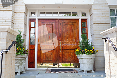 Image of XXXL Wooden Double Door Grand Entrance to a Home