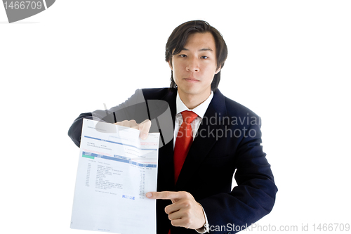 Image of Serious Asian Businessman Pointing to Past Due Medical Bill Isol