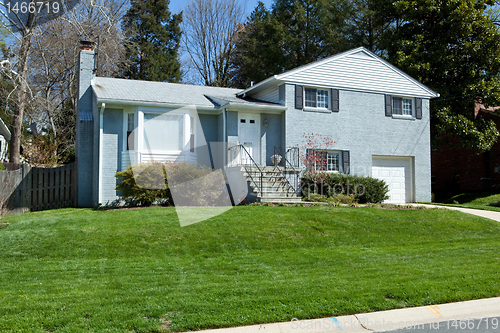 Image of Blue Brick Split Level Single Family House Home Suburban Marylan