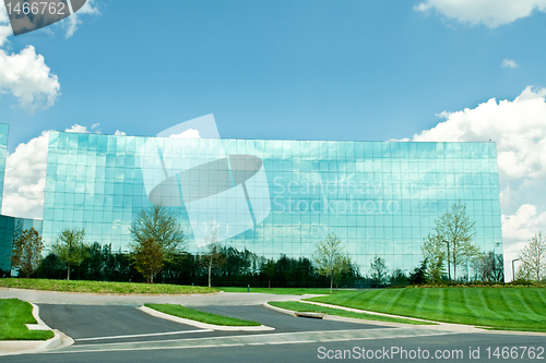 Image of Ultra Modern Mirrored Glass Office Building in Maryland Blue Sky