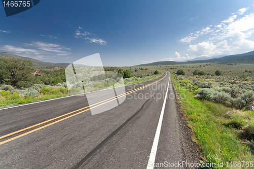 Image of Curving Empty Two Lane Desert Road New Mexico USA
