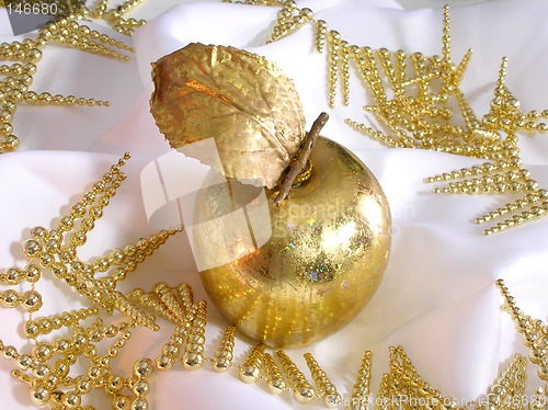 Image of Christmas golden apple decoration
