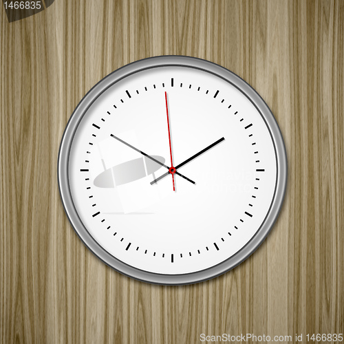 Image of clock on wood