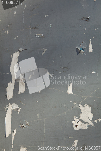 Image of XXXL Gray Paint and Poster Paper Scraps Peeling Off Wall