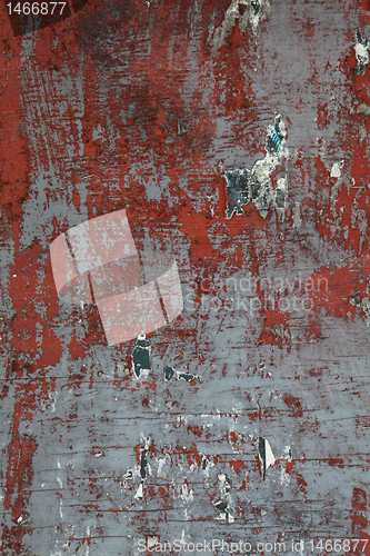 Image of XXXL Grungy Wooden Wall with Peeling Paint and Paper Scraps