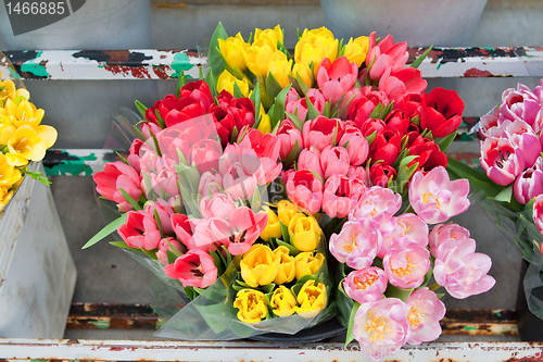 Image of Bouquet of Flowers Tulips in a Old Metal Flourist Display 