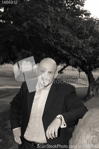 Image of Bald Man Goatee Jacket In a Park, Black and White