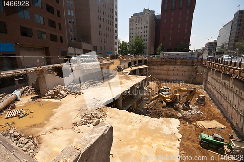 Image of Office Building Being Demolished in Pit Wide Angle Washington, D