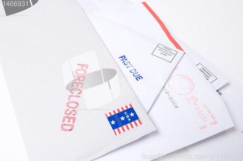 Image of Pile Mail Stamped FORECLOSED PAST DUE Isolated