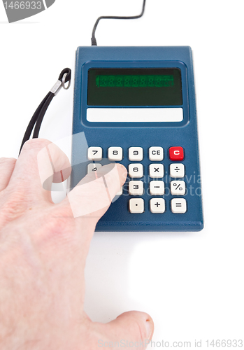 Image of Hand Pushing Key Vintage Calculator Isolated White Background