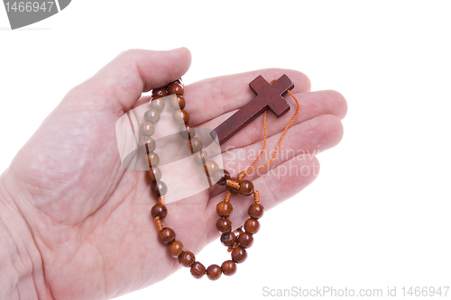 Image of Hand Holding Rosary Cross Isolated White