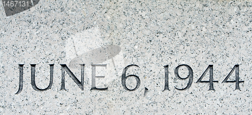 Image of Phrase "June 6 1944" Carved in Gray Granite D-Day