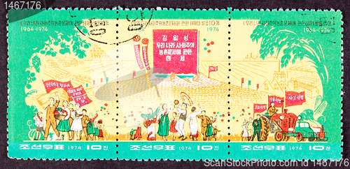 Image of North Korean Postage Stamp Farmers Dancing Grain Piles Tractors