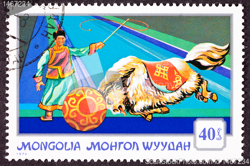 Image of Canceled Mongolian Postage Stamp Performing Yak Pushing Ball, Ci