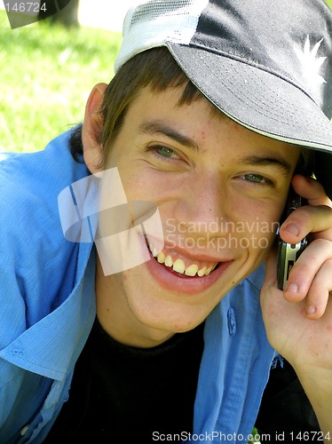 Image of Teenager using a cellular phone