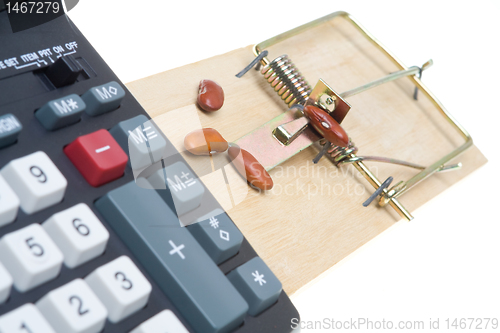 Image of Mouse Trap with Beans and Adding Machine.  Accounting Theme 