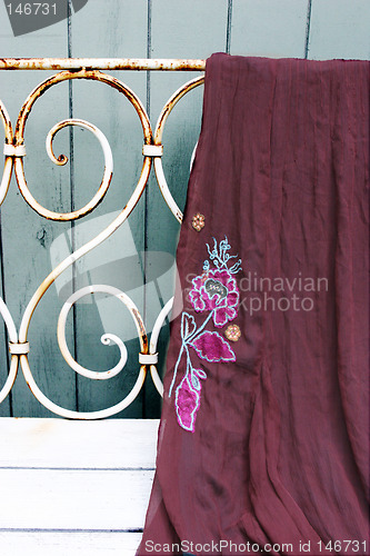 Image of Dress hanging on antique chair