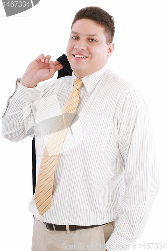 Image of Handsome young businessman wearing suit 