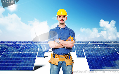Image of smiling worker and solar power