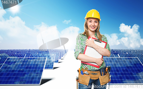 Image of engineer and solar panel