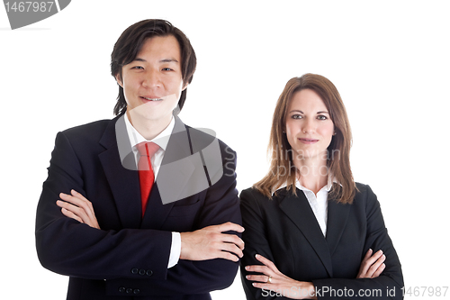 Image of Confident Asian Man Caucasian Woman Business Suits Arms Crossed
