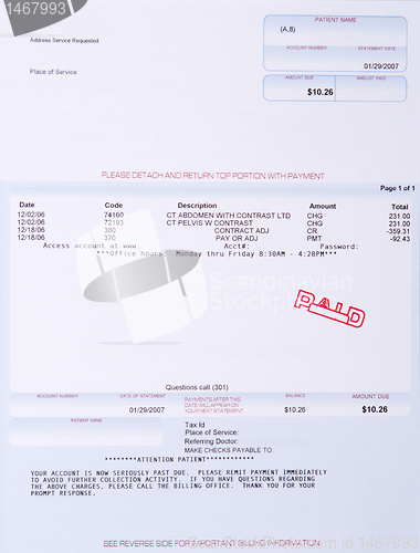 Image of Paper Medical Bill CT Scan Stamped PAID Past Due