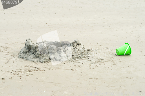 Image of Drip Sand Castle on Beach With a Bucket