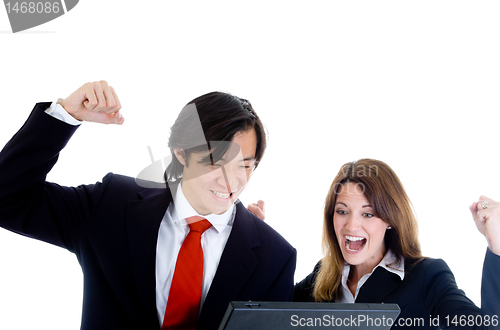 Image of Happy Business Team, Asian Man Caucasian Woman Cheering at Lapto