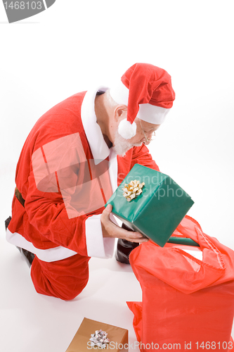 Image of Santa Looking Sack Holding Present Gift Isolated