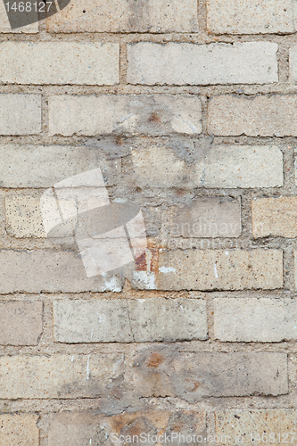 Image of XXXL Grungy Full Frame Stained Patched Yellow Brick Wall