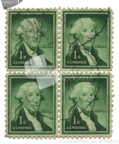 Image of four old postage stamps from USA one cent 