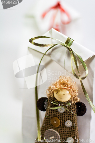 Image of gift with handmade doll