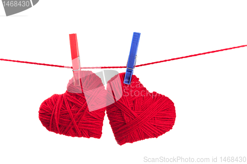 Image of two thread hearts 