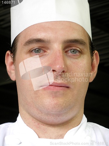 Image of Chef is posing