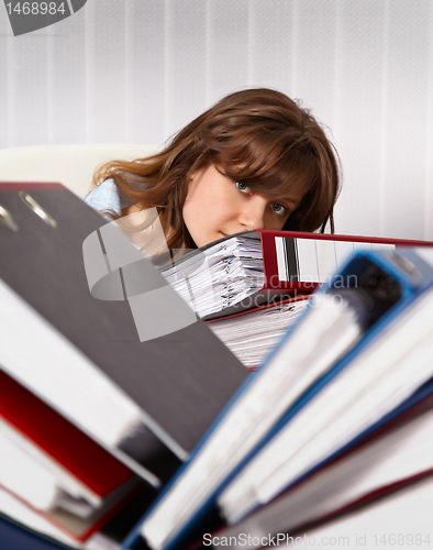 Image of Woman secretary are overworked