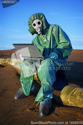 Image of Ecologist scientist in ecological disaster zone